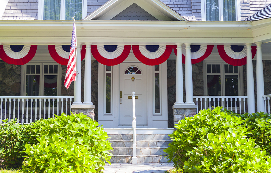 American flag bunting across front porch